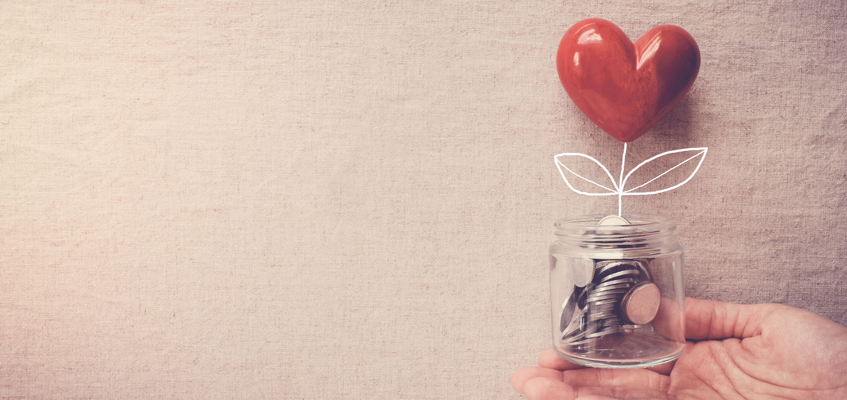 Heart on top of coin jar Heart on top of coin jar